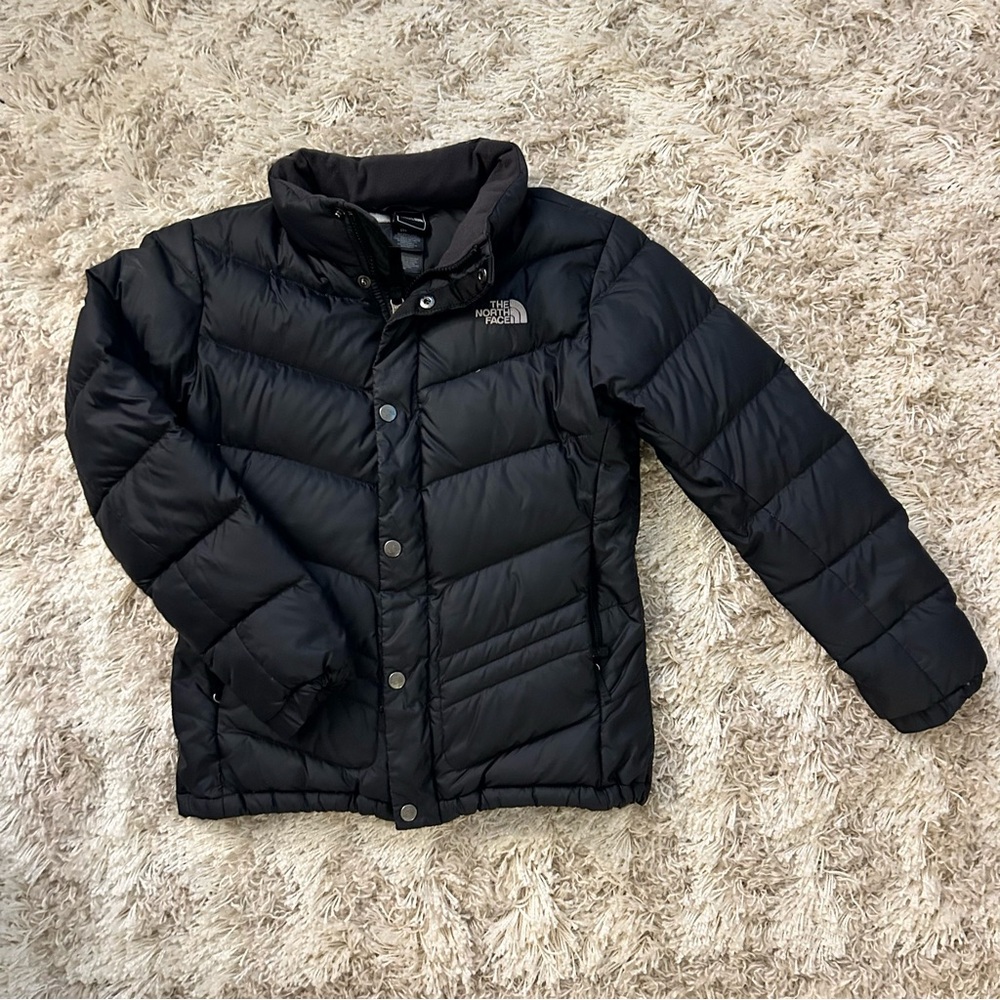 The Northface puffer in black size 14-16 girls